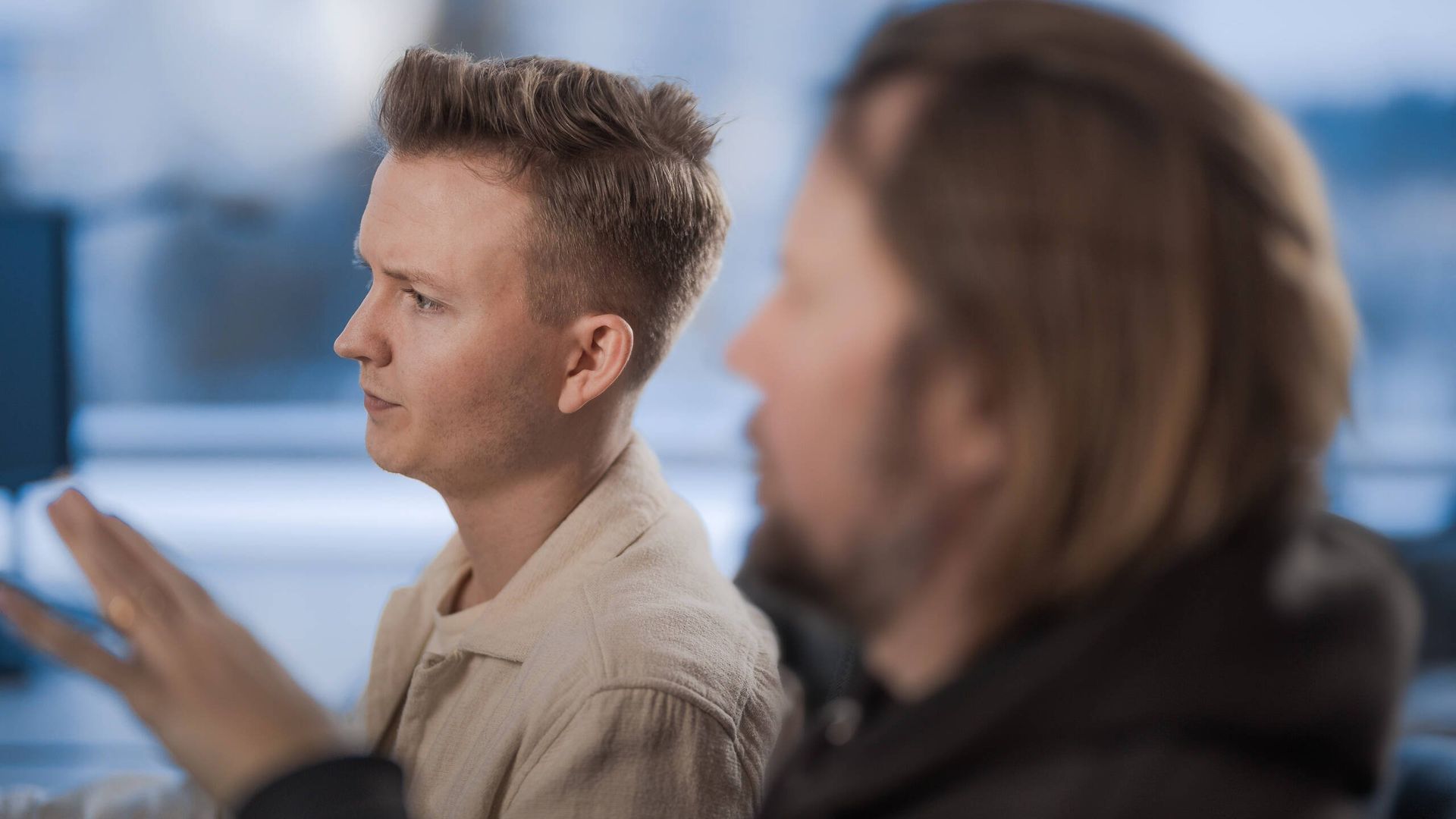 Two men working together