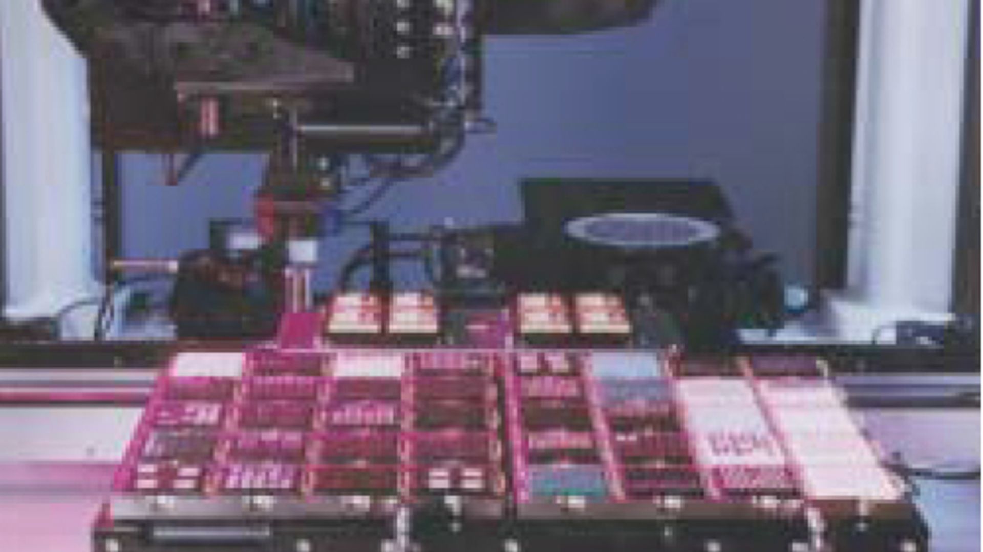 Large flexible work area with wafer and waffle pack inputs and conveyor output