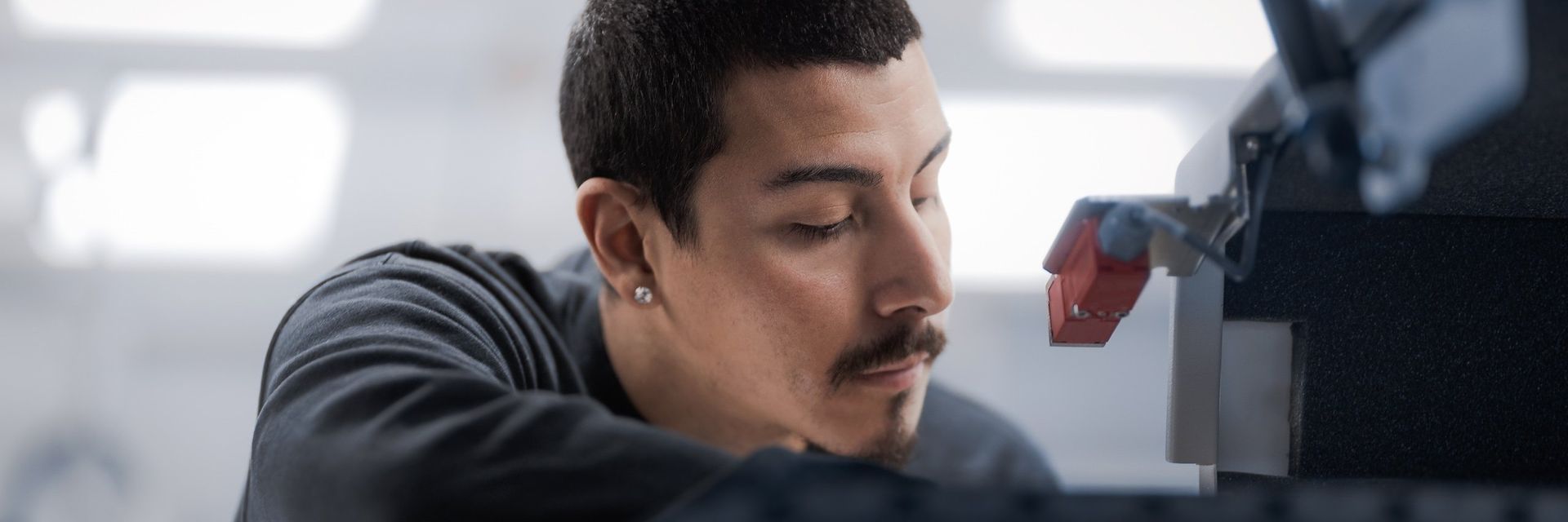 A man working with a machine