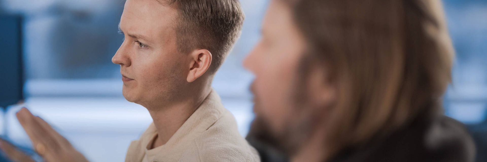 Two men working together