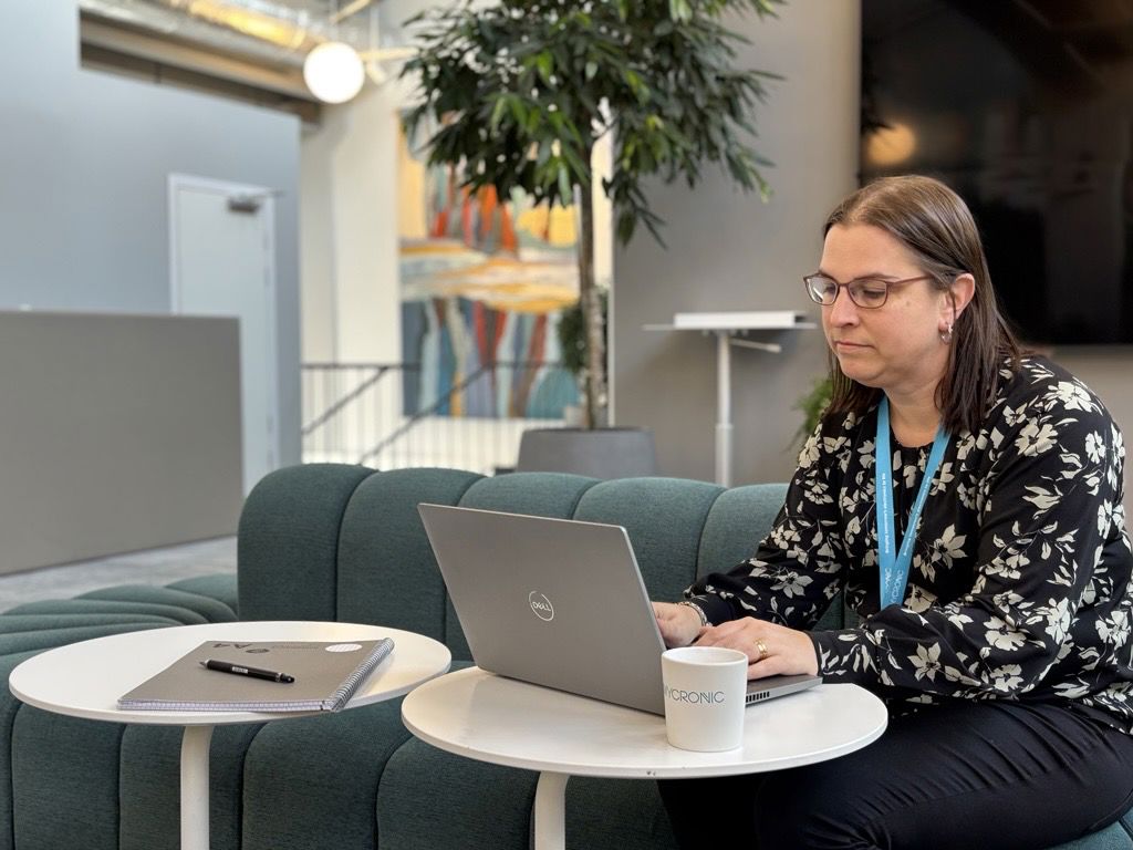 SMT logistics and support team collaborating on customer orders.