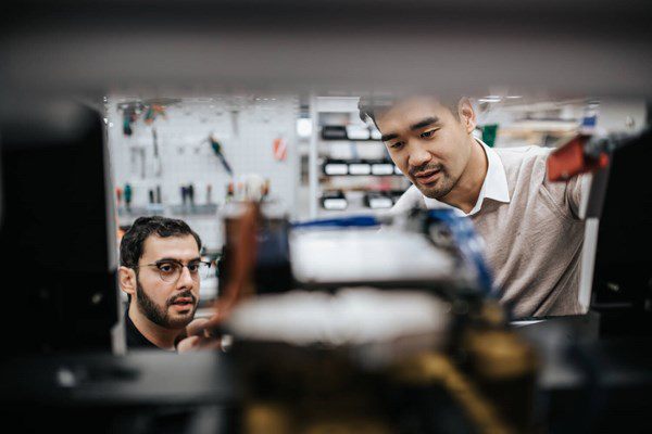 Close-up of two colleagues in production