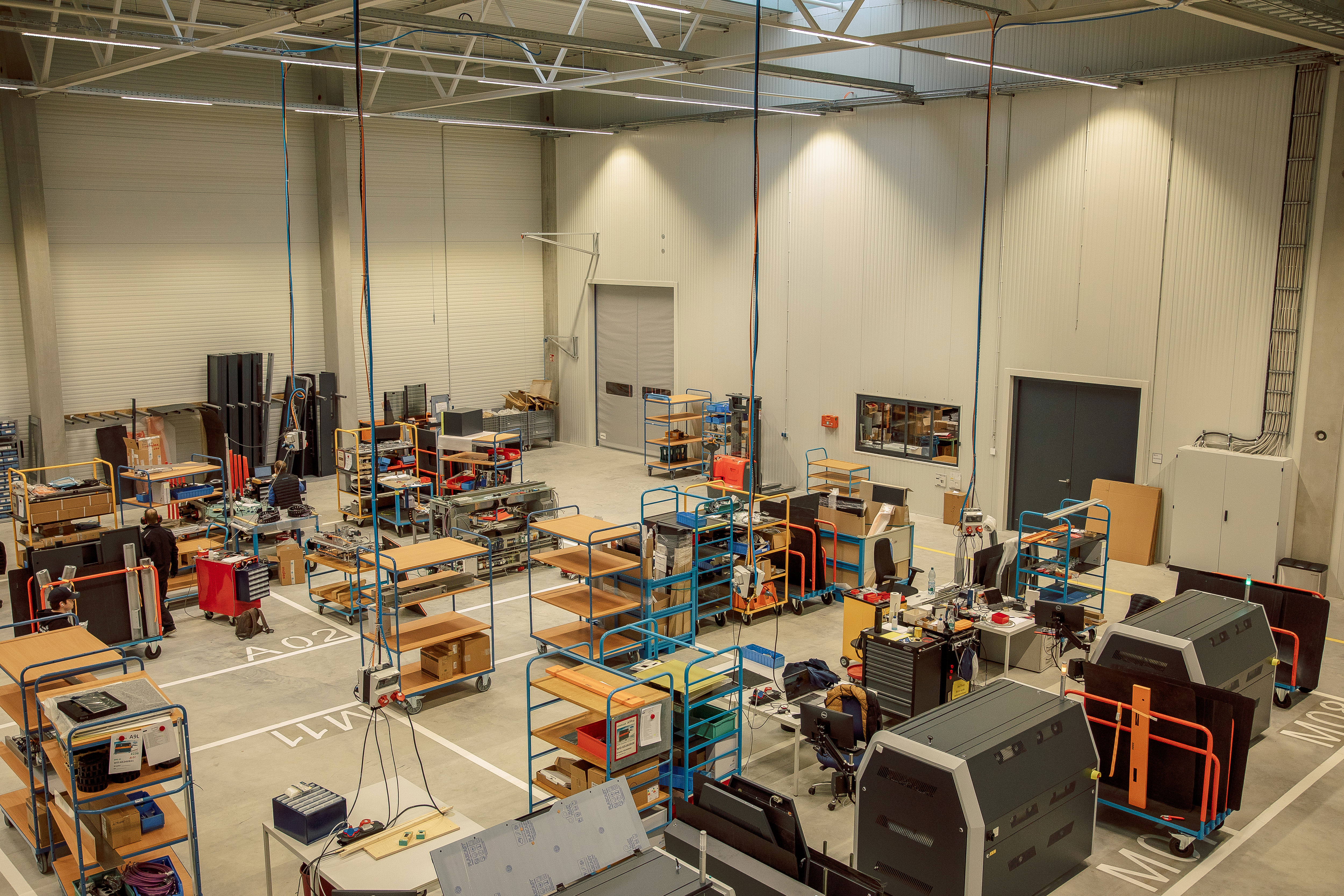 An image overlooking aproduction hall for PCB Test systems